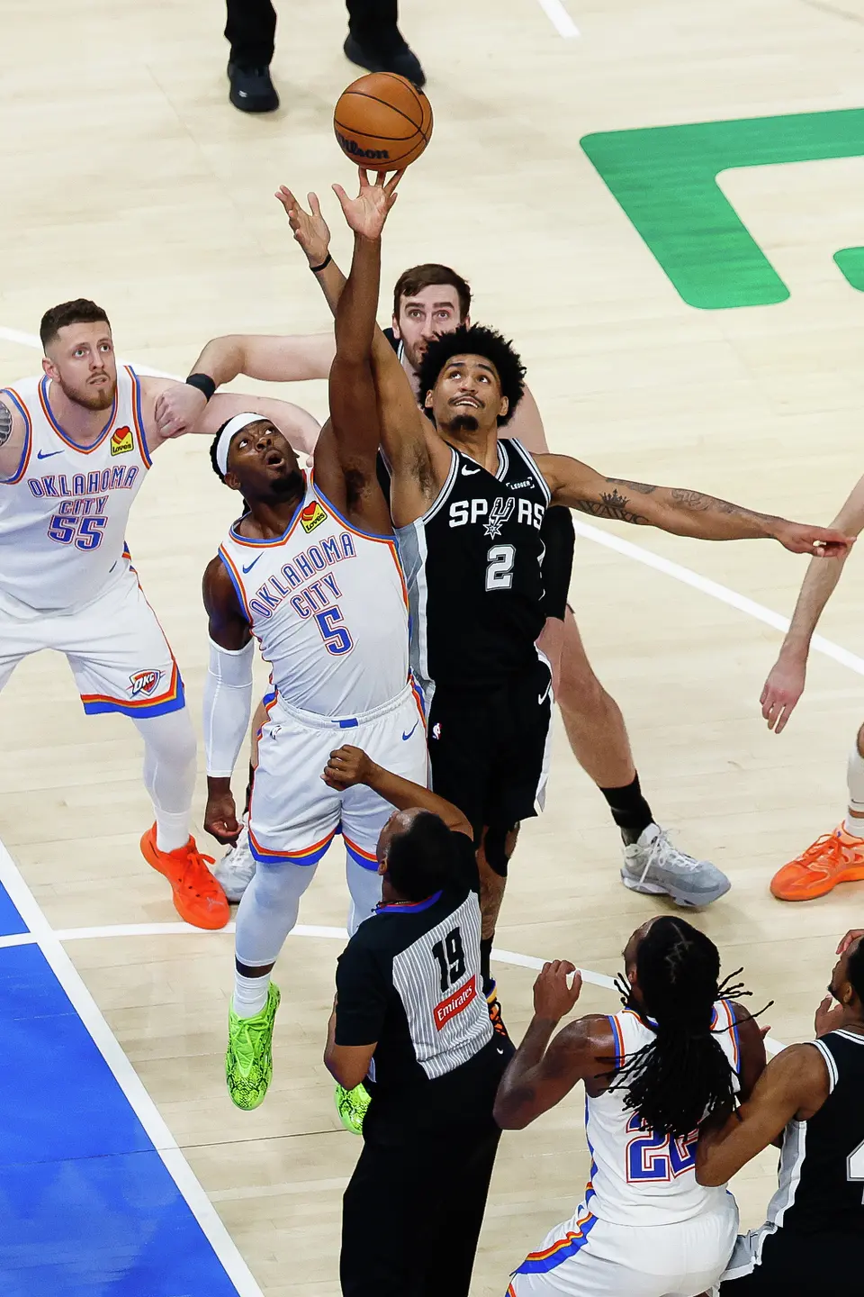 San Antonio Spurs guard Dylan Harper (2) and Oklahoma City Thunder guard Luguentz Dort (5) jump for the ball during the second quarter of Game 5 of the Western Conference Finals at Paycom Center in Oklahoma City, Tuesday, May 26, 2026.