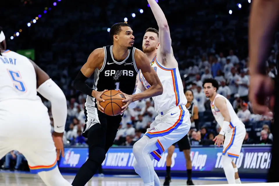 San Antonio Spurs center Victor Wembanyama (1) drives the ball forward during the third quarter of Game 5 of the Western Conference Finals at Paycom Center in Oklahoma City, Tuesday, May 26, 2026.