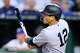 Trent Grisham, de los Yankees de Nueva York, observa su jonrón solitario durante la séptima entrada del juego de béisbol contra los Reales de Kansas City, el martes 26 de mayo de 2026, en Kansas City, Missouri.