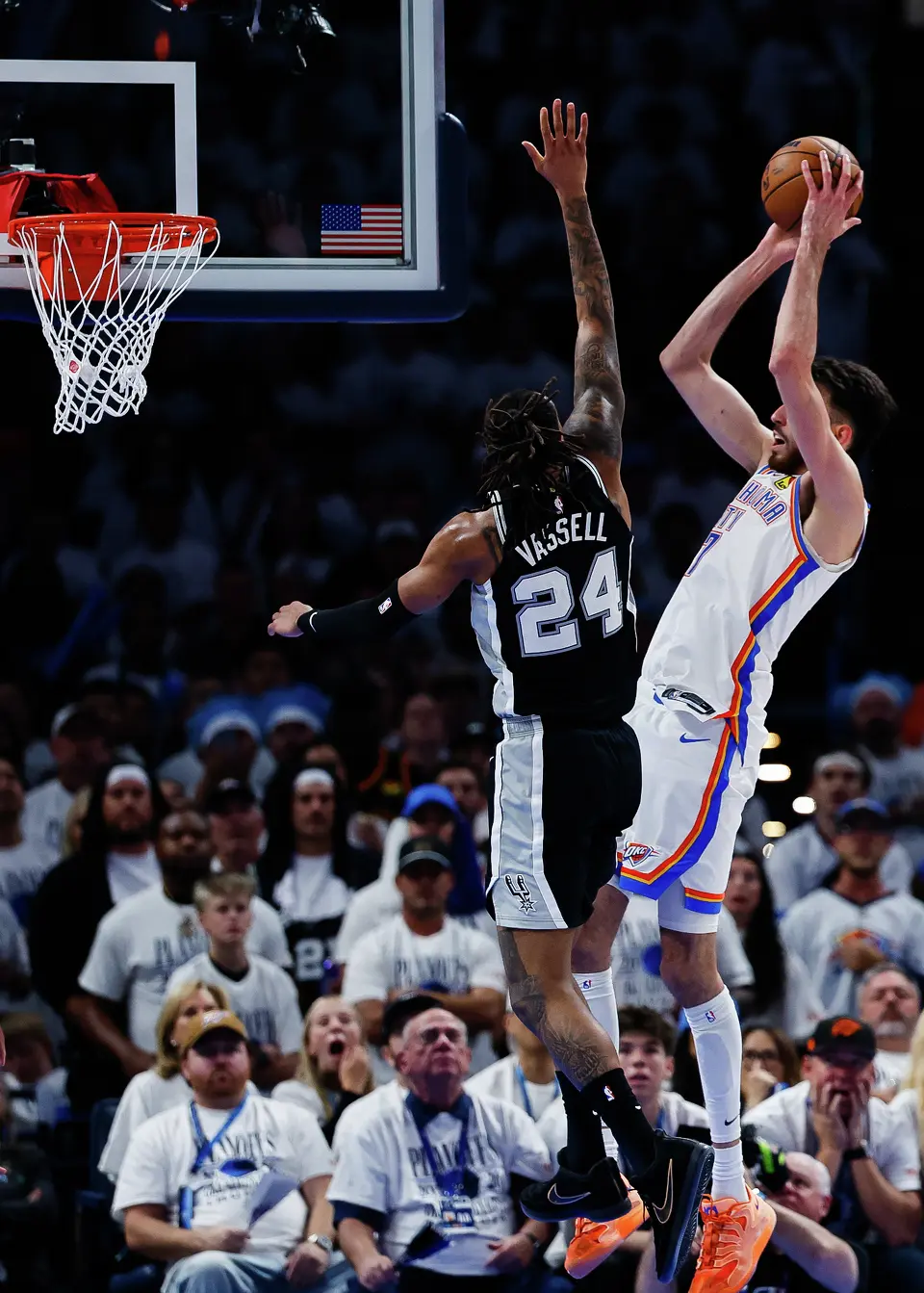 Oklahoma City Thunder center Chet Holmgren (7) goes up for a shot while defended by San Antonio Spurs guard Devin Vassell (24) during the third quarter of Game 5 of the Western Conference Finals at Paycom Center in Oklahoma City, Tuesday, May 26, 2026.