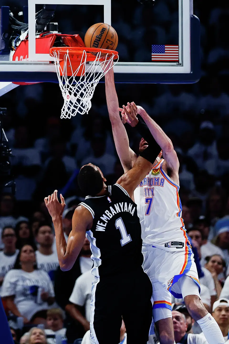 Oklahoma City Thunder center Chet Holmgren (7) goes up for a shot and gets tangled with San Antonio Spurs center Victor Wembanyama (1) during the third quarter of Game 5 of the Western Conference Finals at Paycom Center in Oklahoma City, Tuesday, May 26, 2026.