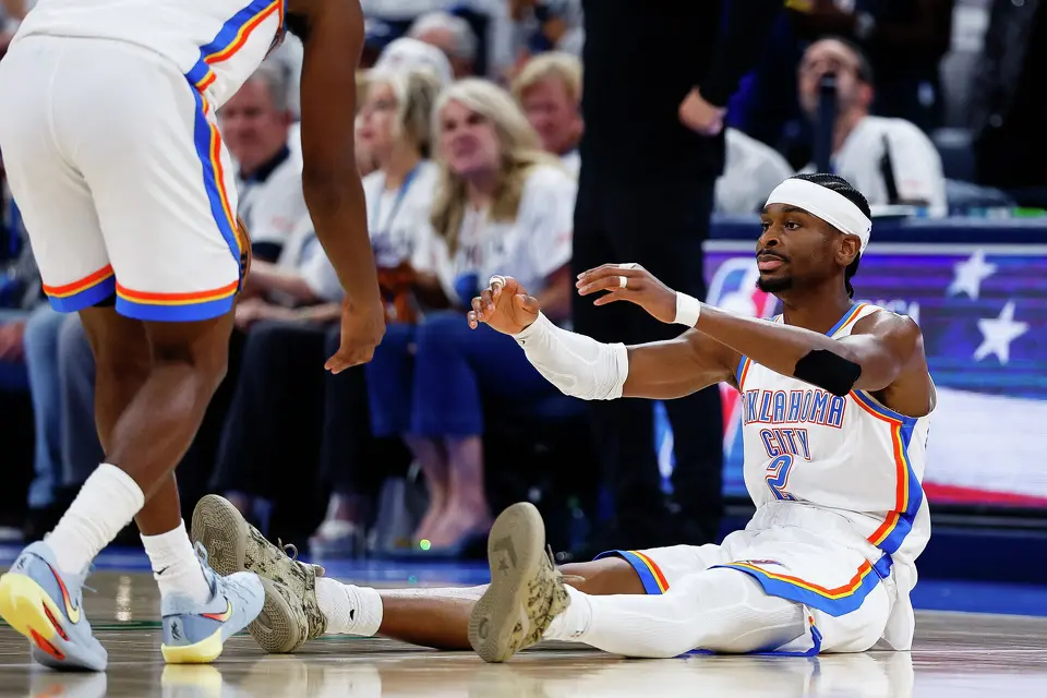 Oklahoma City Thunder guard Shai Gilgeous-Alexander (2) reaches for teammate Oklahoma City Thunder guard Cason Wallace (22) during the third quarter of Game 5 of the Western Conference Finals at Paycom Center in Oklahoma City, Tuesday, May 26, 2026.
