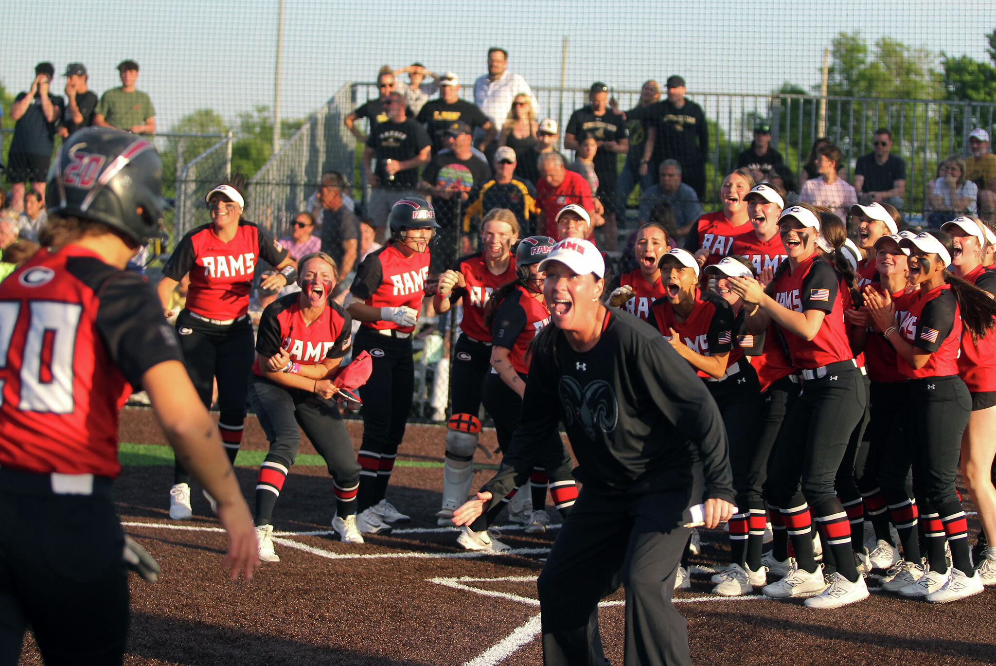 McCue sent the ball over the left field fence in the bottom of the eighth to give the Rams their second conference title in three seasons.