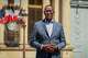 French lawmaker Max Mathiasin of the French Caribbean island Guadeloupe, poses at the entrance of the National Assembly in Paris, Wednesday, May 27, 2026, before lawmakers examine a bill to formally repeal the Code Noir, or Black Code, the 17th-century royal edict that governed slavery in French colonies and treated enslaved people as property.