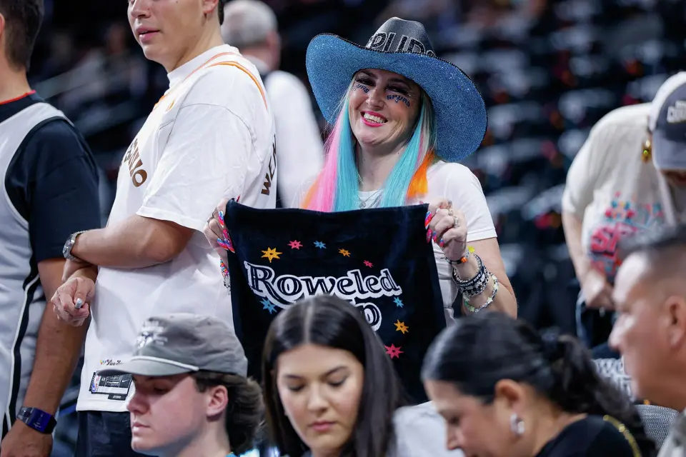 A San Antonio Spurs fan smiles as she hypes herself up before Game 6 of the Western Conference Finals between the Oklahoma City Thunder and the San Antonio Spurs at Frost Bank Center in San Antonio, Thursday, May 28, 2026.