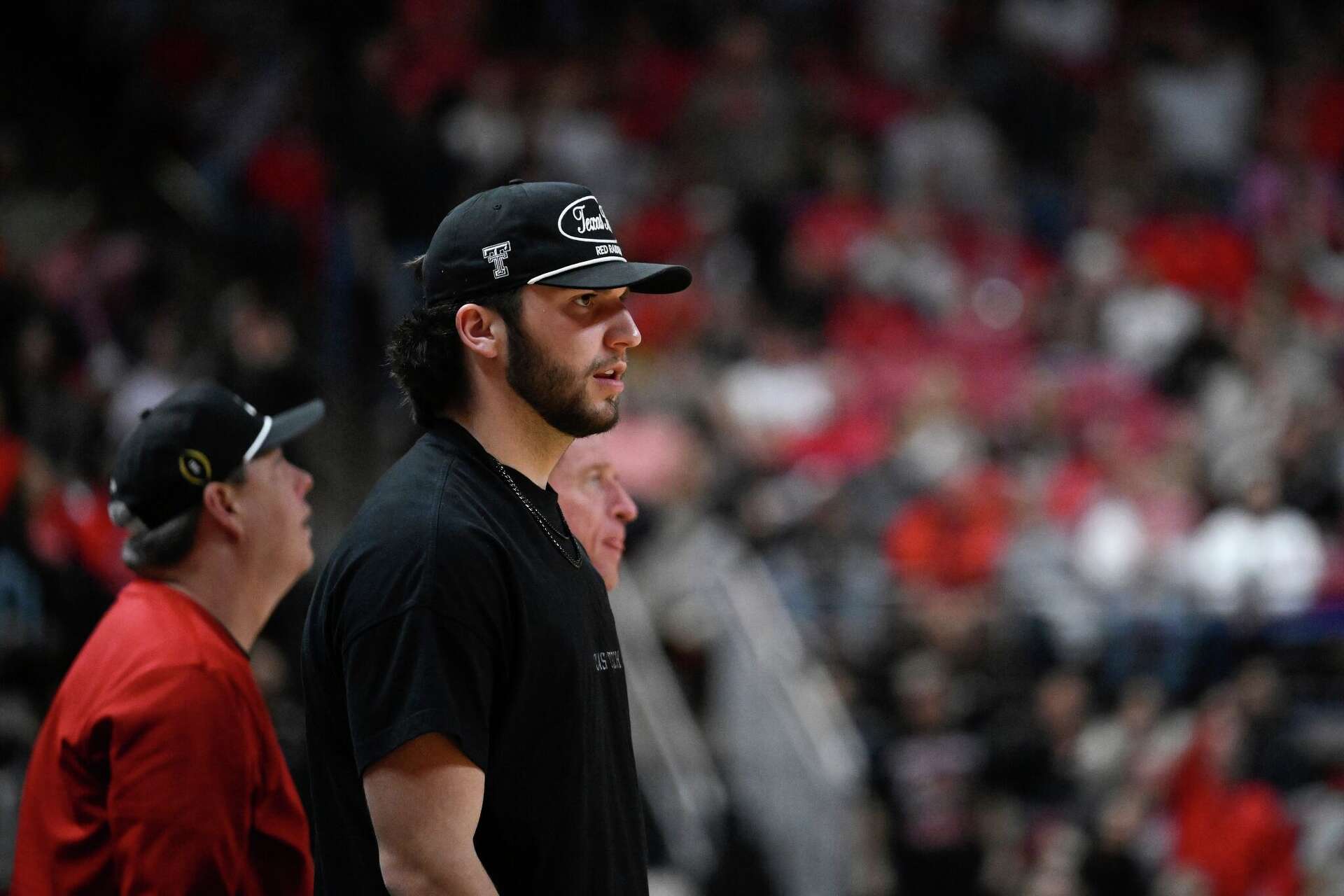 Texas Tech quarterback Brendan Sorsby watches from the stands during the second half of an NCAA college basketball game between Texas Tech and Cincinnati Tuesda