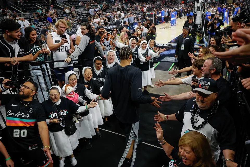 Salesian Sisters of St. John Bosco cheer on the San Antonio Spurs during Game 6 of the Western Conference Finals at Frost Bank Center in San Antonio, Thursday, May 28, 2026.