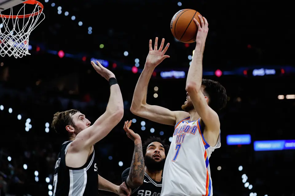 San Antonio Spurs center Luke Kornet (7) and San Antonio Spurs forward Julian Champagnie (30) go up to block Oklahoma City Thunder center Chet Holmgren (7) during Game 6 of the Western Conference Finals at Frost Bank Center in San Antonio, Thursday, May 28, 2026.