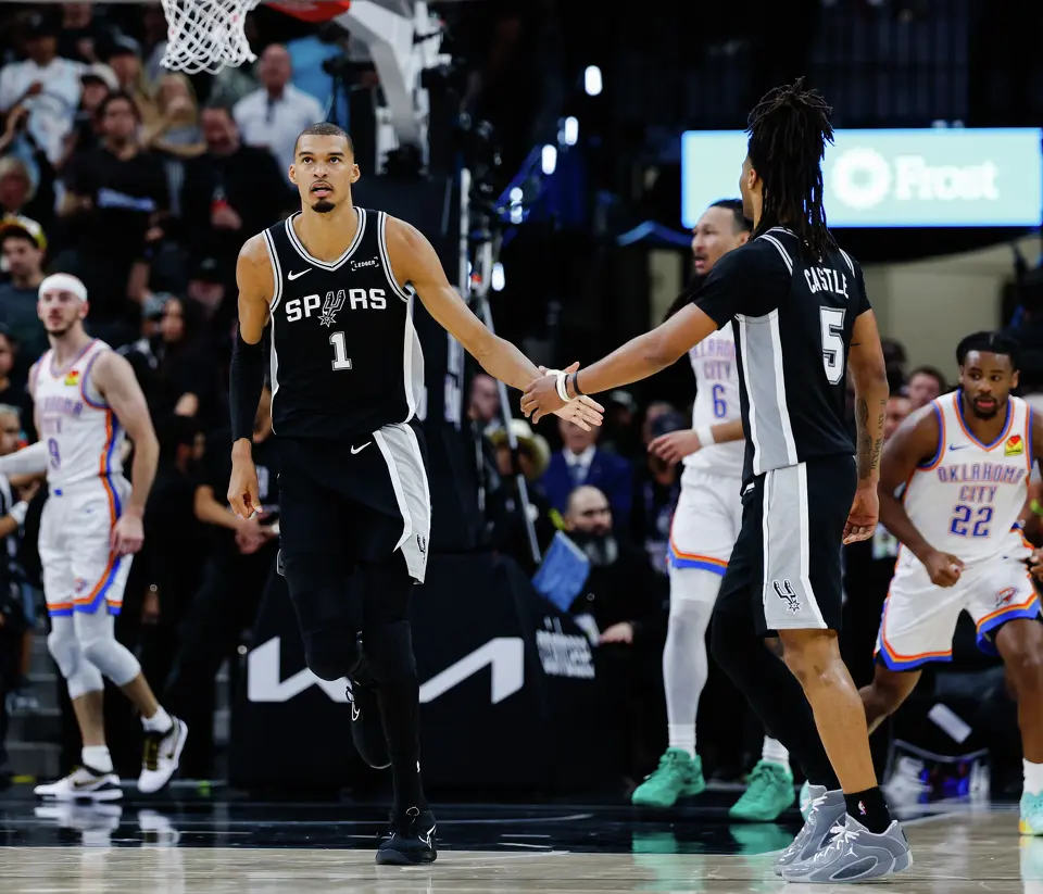 San Antonio Spurs center Victor Wembanyama (1) high-fives San Antonio Spurs guard Stephon Castle (5) during Game 6 of the Western Conference Finals at Frost Bank Center in San Antonio, Thursday, May 28, 2026.