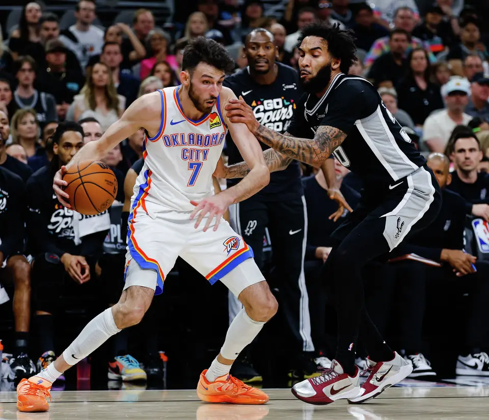 San Antonio Spurs forward Julian Champagnie (30) guards Oklahoma City Thunder center Chet Holmgren (7) Game 6 of the Western Conference Finals at Frost Bank Center in San Antonio, Thursday, May 28, 2026.