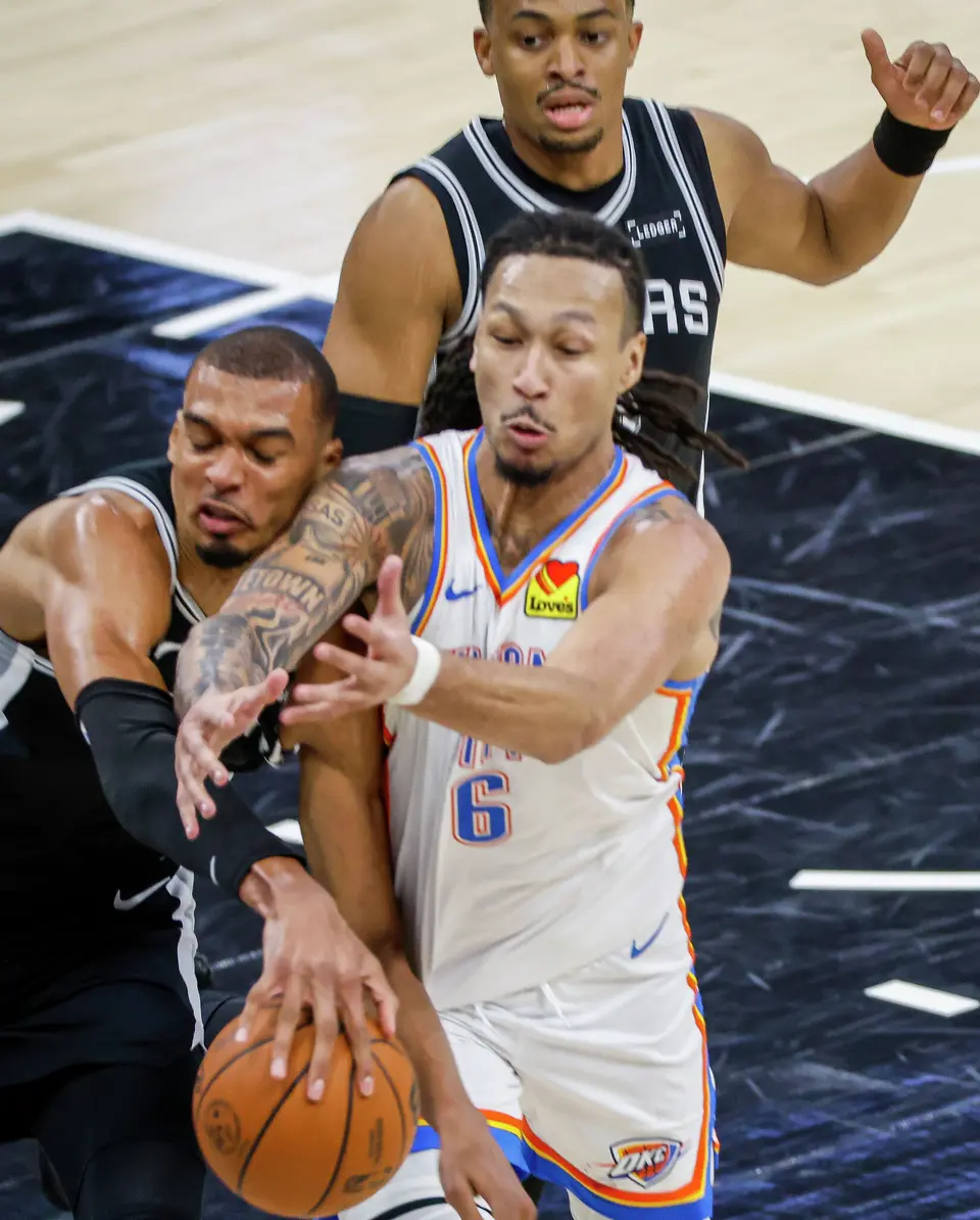 San Antonio Spurs center Victor Wembanyama (1) and Oklahoma City Thunder forward Jaylin Williams (6) fight for the ball during Game 6 of the Western Conference Finals at Frost Bank Center in San Antonio, Thursday, May 28, 2026.