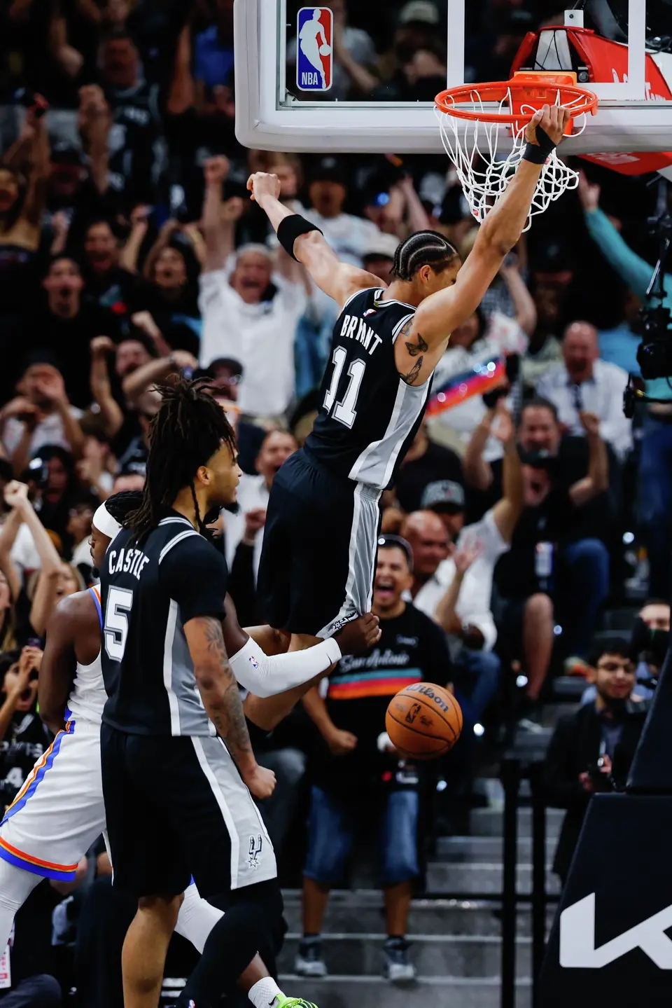 San Antonio Spurs forward Carter Bryant (11) dunks the ball during Game 6 of the Western Conference Finals at Frost Bank Center in San Antonio, Thursday, May 28, 2026.