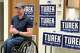 Iowa state Rep. Josh Turek, a Democratic candidate for U.S. Senate, talks to a voter in Ellston, Iowa, Wednesday, May 27, 2026.