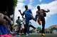 Migrants from Congo dance during a semifinal soccer match against Mali for the Kypseli Mundial in Athens,Greece, on Sunday, May 24, 2026.