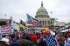 FILE - Rioters loyal to President Donald Trump rally at the U.S. Capitol in Washington, Jan. 6, 2021.