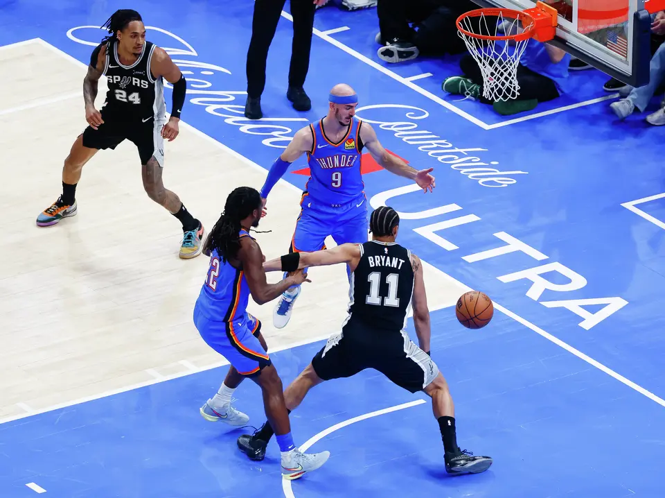 San Antonio Spurs forward Carter Bryant (11) tries to get the rebound during Game 7 of the Western Conference finals at Paycom Center in Oklahoma City, on Saturday, May 30, 2026.