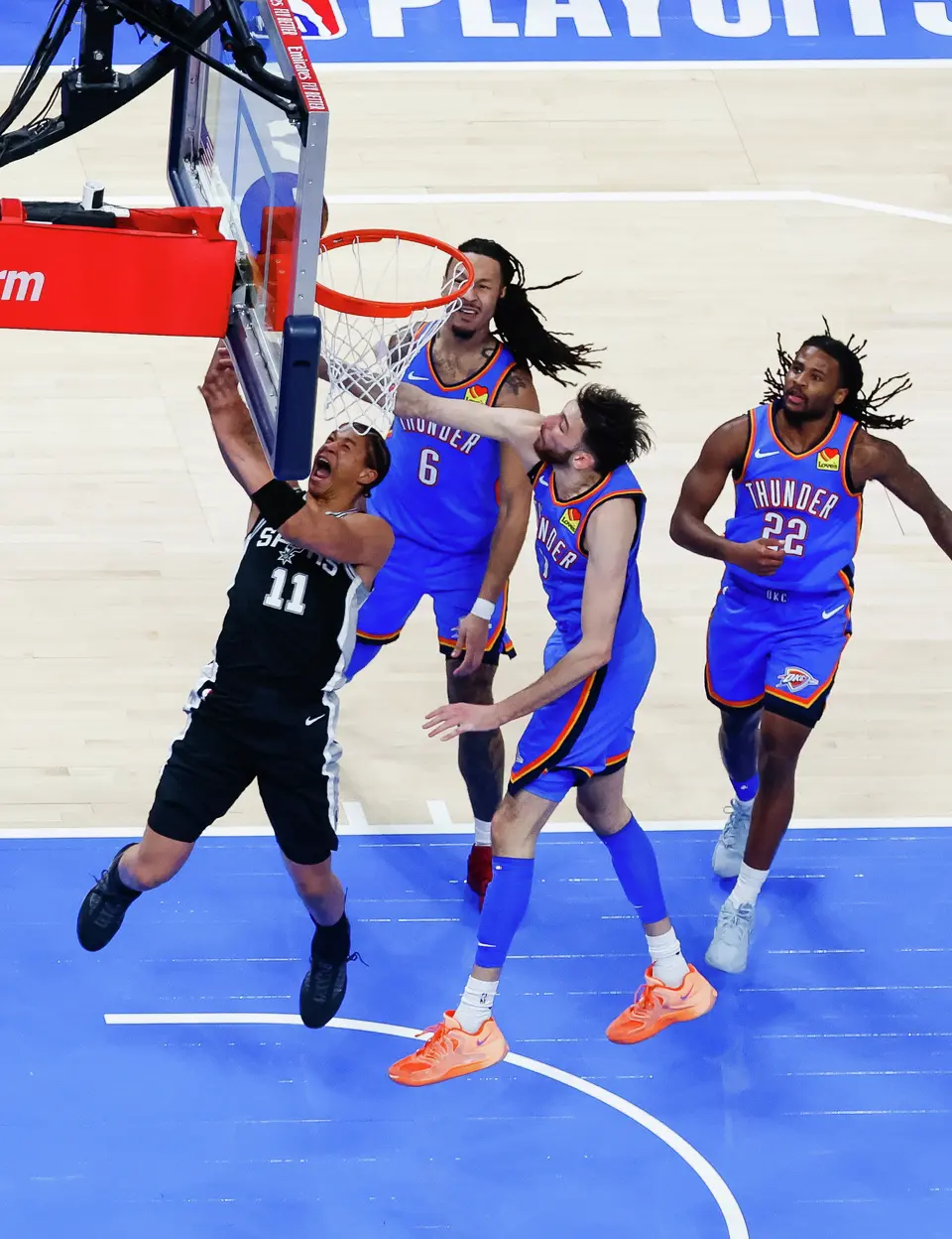 San Antonio Spurs forward Carter Bryant (11) goes up for a shot during Game 7 of the Western Conference finals at Paycom Center in Oklahoma City, on Saturday, May 30, 2026.