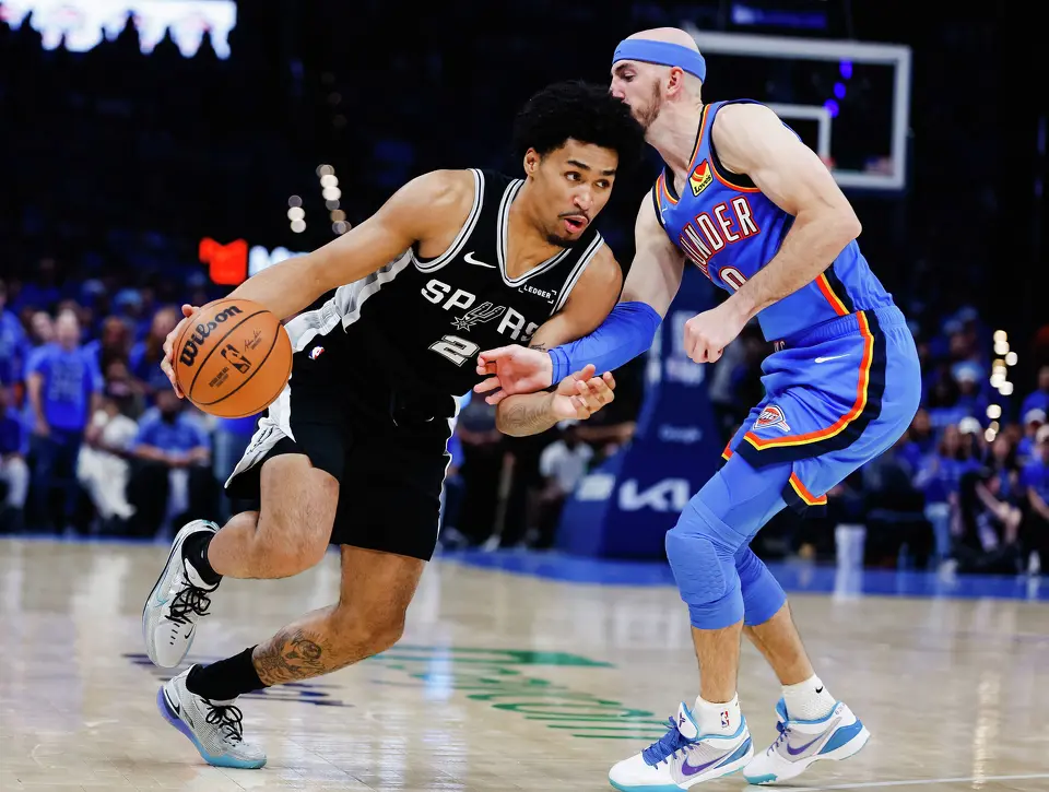 San Antonio Spurs guard Dylan Harper (2) dribbles the ball during Game 7 of the Western Conference finals at Paycom Center in Oklahoma City, on Saturday, May 30, 2026.