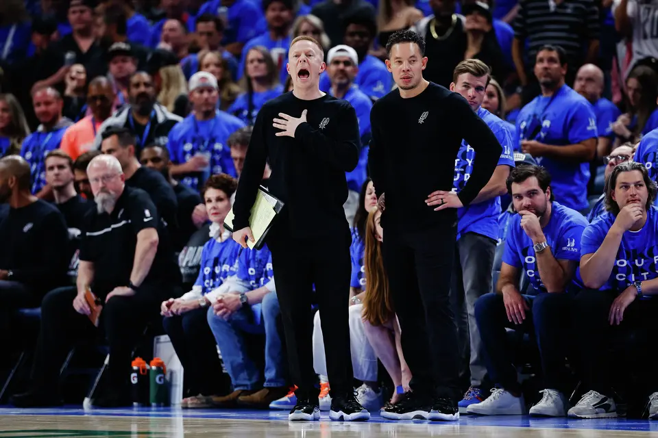 San Antonio Spurs assistant head coach Sean Sweeney and head coach Mitch Johnson talk to the team during the third quarter of Game 7 of the Western Conference Finals at Paycom Center in Oklahoma City, Saturday, May 30, 2026.