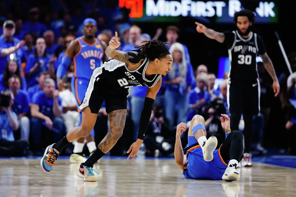 San Antonio Spurs guard Devin Vassell (24) gets up from the court during the third quarter of Game 7 of the Western Conference Finals at Paycom Center in Oklahoma City, Saturday, May 30, 2026.