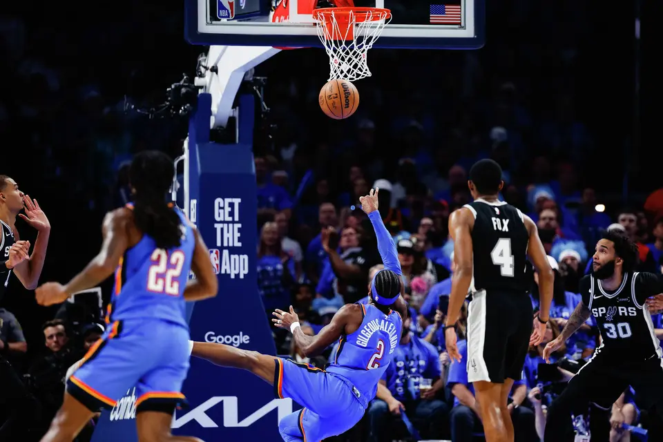 Oklahoma City Thunder guard Shai Gilgeous-Alexander (2) falls while going for a shot during the third quarter of Game 7 of the Western Conference Finals at Paycom Center in Oklahoma City, Saturday, May 30, 2026.