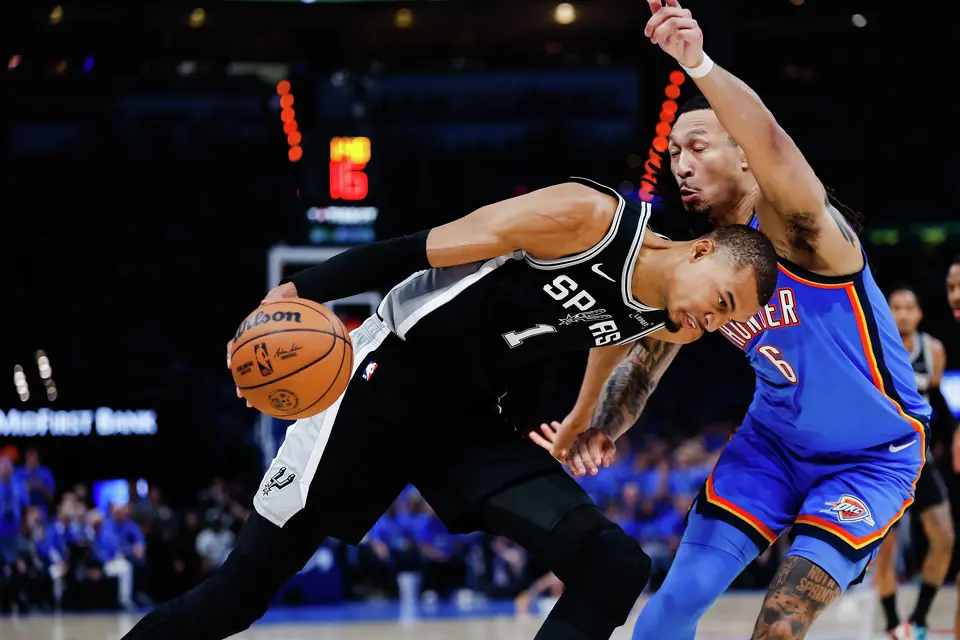San Antonio Spurs center Victor Wembanyama (1) drives the ball forward during the third quarter of Game 7 of the Western Conference Finals at Paycom Center in Oklahoma City, Saturday, May 30, 2026.