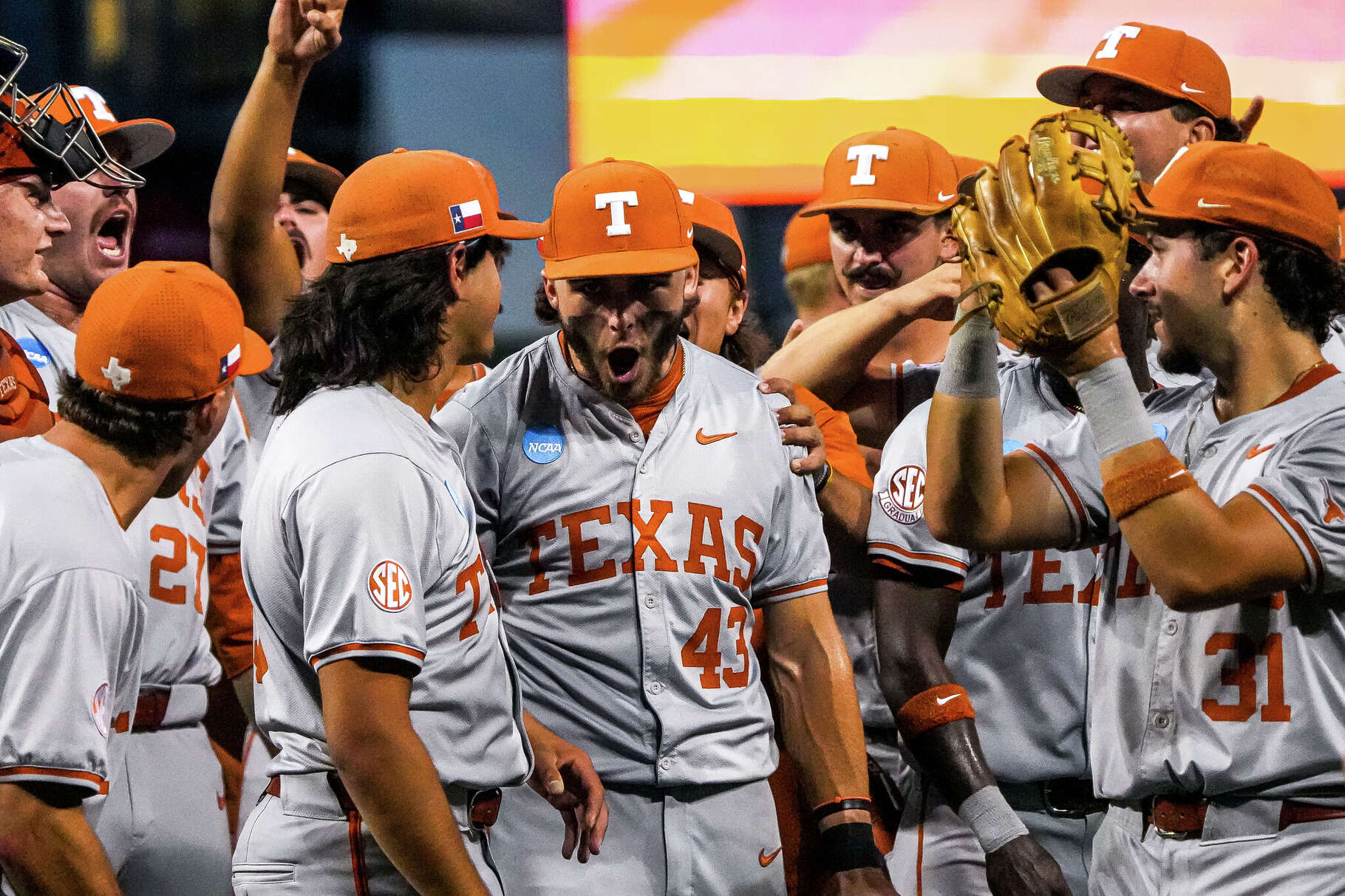 Texas Longhorns outfielder Aiden Robbins (43) and his team celebrate winning the NCAA Baseball Regional game against UC Santa Barbara at UFCU Disch-Falk Field on Sunday, May 301 2026 in Austin.