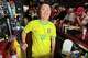 Lion Sports Bar owner Mark Prinzinger poses behind the bar as fans watch a Champion league soccer match between Arsenal and Paris Saint-Germain, Saturday, May 30, 2026, in Philadelphia.