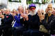 Michael Stipe of R.E.M. claps as Kim Hastreiter speaks during Beyond Trend.
