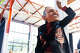 Artist William Scott walks down the runway dressed in a Barack Obama mask and suit he created during Creative Growth's Beyond Trend fashion show at Ciel Creative Space in Berkeley.