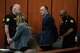 Chikei Rick Chow, a convenience store owner accused in the 2023 fatal shooting of a Black 14-year-old, is escorted out of the courtroom during closing arguments in his murder trial, Monday, June 1, 2026, in Columbia, S.C.