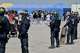 Police conduct a search operation at a makeshift camp of migrants who want to cross the English Channel to Britain near Dunkirk, northern France, Wednesday, May 27, 2026.