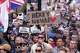 People gather to protest outside Southampton police station, Southampton, England, Tuesday June 2, 2026, after the fatal stabbing of Henry Nowak, a British teenager who was handcuffed despite claiming he was the crime victim. (Gareth Fuller/PA via AP)