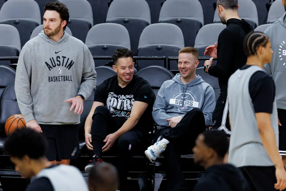 San Antonio Spurs Head Coach Mitch Johnson, center left, and Associate Head Coach Sean Sweeney talk during practice at Frost Bank Center in San Antonio, Tuesday, June 2, 2026, ahead of the NBA Finals series against the New York Knicks.