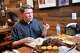 James Talarico, the Democratic nominee for Senate, eating barbecue Tuesday at Smokey Joe’s BBQ in Oak Cliff.