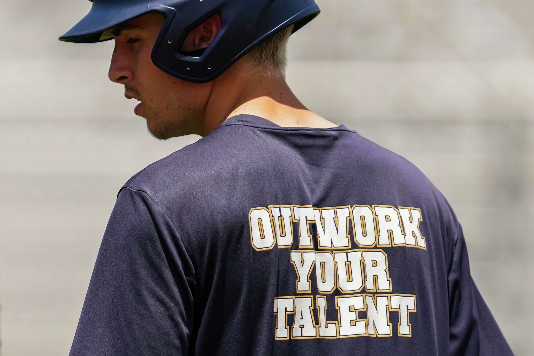 Lake Creek players wear t-shirts that read “Outwork Your Talent” during practice ahead of the team’s state title game at the UIL State Baseball Championships in Round Rock, Tuesday, June 2, 2026.