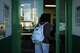 Makeda Walker-Deen, a junior at Susan Miller Dorsey Senior High School, enters the school in Los Angeles, Thursday, May 14, 2026.