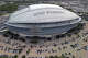 An overall aerial exterior general view of AT&T Stadium before an NFL football game between the Dallas Cowboys and the New York Giants, Sunday, Nov. 12, 2023, in Arlington, Texas. The 2026 World Cup final will be played at MetLife Stadium in East Rutherford, N.J., on July 19. FIFA made the announcement Sunday, Feb. 4, 2024, at a Miami television studio, allocating the opener of the 39-day tournament to Mexico City's Estadio Azteca on June 11. Semifinals will be played on July 14 at AT&T Stadium in Arlington, Texas, and the following day at Mercedes Benz Stadium in Atlanta. (AP Photo/Tyler Kaufman)