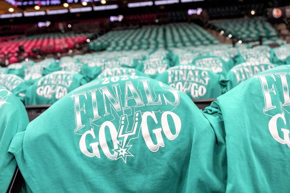 Spurs finals shirts are placed on the back of seats before Game 1 of the NBA Finals at Frost Bank Center in San Antonio, Wednesday, June 3, 2026.