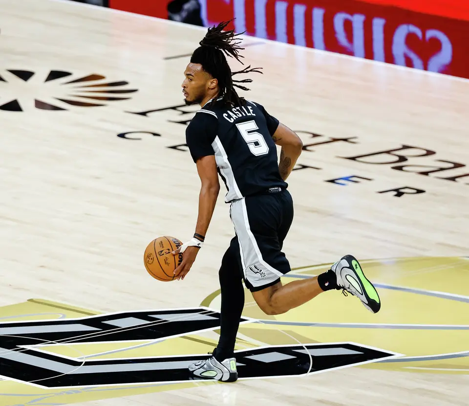 San Antonio Spurs guard Stephon Castle (5) dribbles down the court during the first quarter of Game 1 of the NBA Finals at Frost Bank Center in San Antonio, on Wednesday, June 3, 2026.