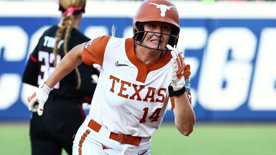 Reese Atwood of the Texas Longhorns runs to base during game one of the Division I Softball Championship series against the Texas Tech Red Raiders held at Devon Park on June 3, 2026 in Oklahoma City, Oklahoma. 