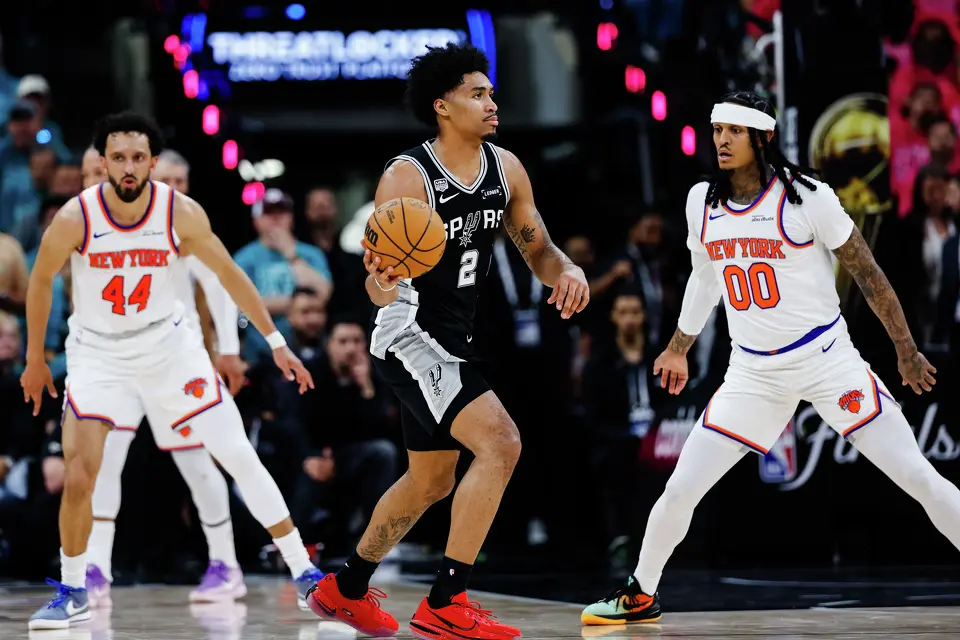 San Antonio Spurs guard Dylan Harper (2) looks to make a pass during Game 1 of the NBA Finals at Frost Bank Center in San Antonio, on Wednesday, June 3, 2026.