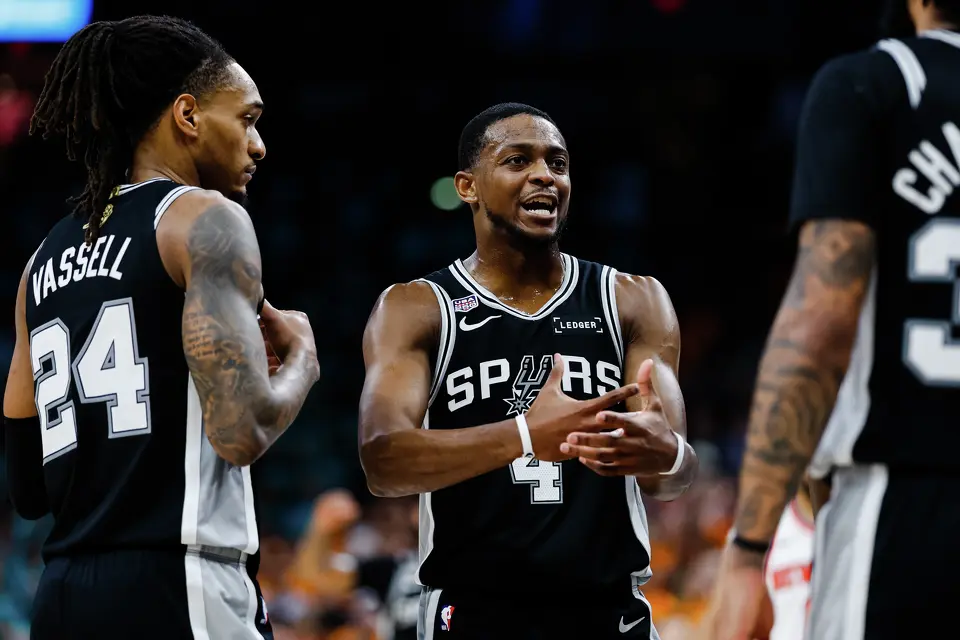 San Antonio Spurs guard De'Aaron Fox (4) reacts to a play during Game 1 of the NBA Finals against the New York Knicks at Frost Bank Center in San Antonio, on Wednesday, June 3, 2026.