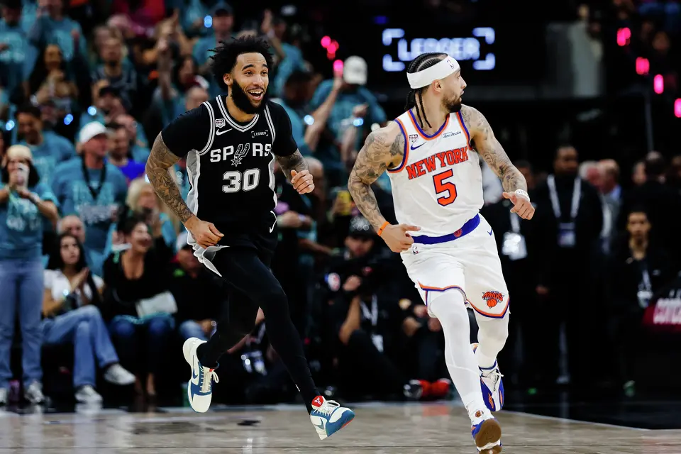 San Antonio Spurs forward Julian Champagnie (30) celebrates a three-pointer during Game 1 of the NBA Finals against the New York Knicks at Frost Bank Center in San Antonio, on Wednesday, June 3, 2026.