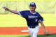 Marquette Catholic pitchers Keller Jacobs throws to a Pleasant Plains batter on Wednesday night in a Class 2A section...