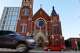 Traffic passes along Ross Ave. by National Shrine Cathedral of Our Lady of Guadalupe, on, Friday, Dec. 8, 2023, in Dallas.