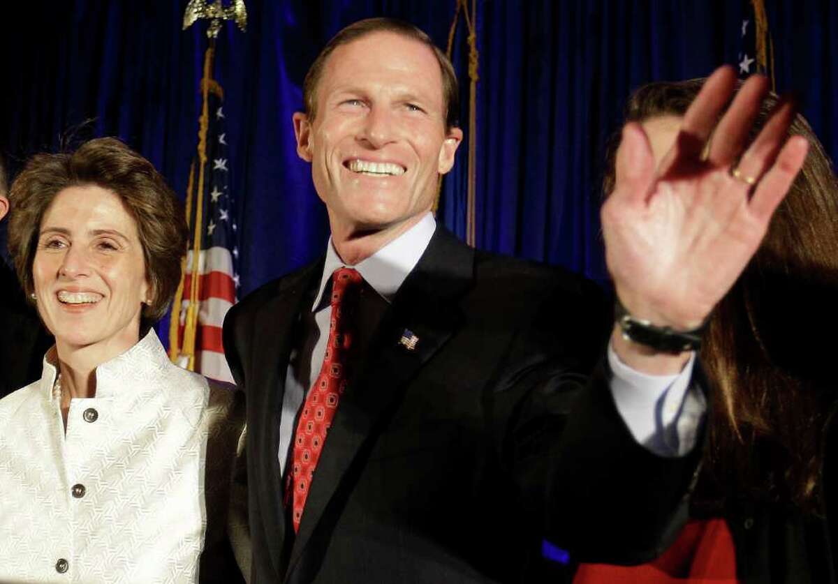 In this Nov. 2 photo, Connecticut Attorney General and newly elected U.S. Sen. Richard Blumenthal, D-Conn., and his wife Cynthia celebrate during his election night rally in Hartford. (AP Photo/Stephan Savoia)