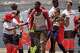 FILE - Migrants disembark at the port of "La Estaca" in Valverde on the Canary island of El Hierro, Spain, Aug. 26, 2024. Emergency services said the migrants arrived by boat after a 13-day voyage from Senegal.