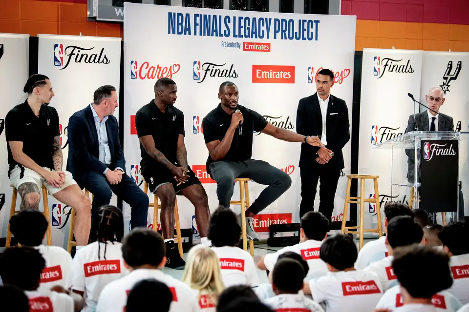 San Antonio Spurs player Bismack Biyombo addresses the audience during the Legacy Project NBA Cares event at the Denver Heights Community Center on Thursday.