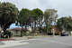 A home and community center next to the vacant 555 Kelly Ave. lot in Half Moon Bay, Calif., on June 1, 2026. A home and community center next to the vacant 555 Kelly Ave. lot in Half Moon Bay, Calif., on June 1, 2026.